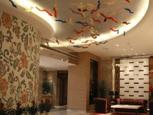 Haishu Taosheng Yiju Business Hotel Ningbo Esterno foto